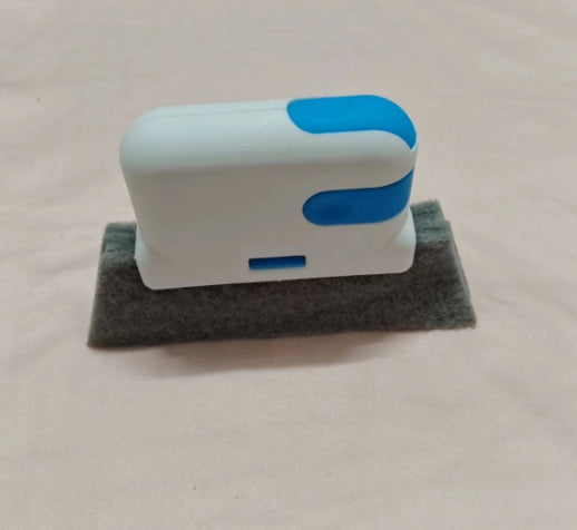 Elemento de limpeza removível da escova para ranhuras
