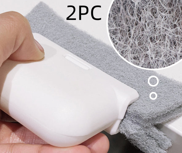 Escova com fibras para recolher pó acumulado em calhas